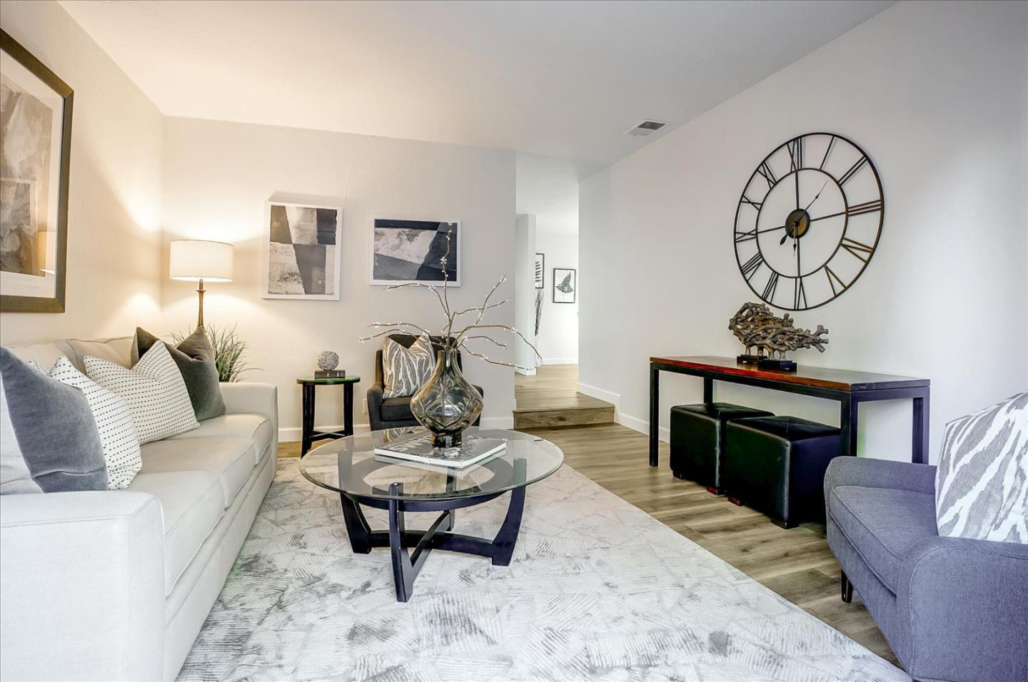 5282 Pebbletree Way San Jose, CA 95111 - Photo 17 of 39 a living room with furniture a rug and a fireplace
