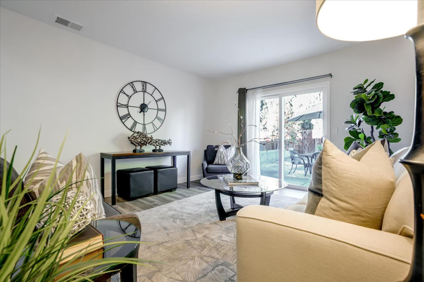 5282 Pebbletree Way San Jose, CA 95111 - Photo 19 of 39 a living room with furniture a window and a fireplace