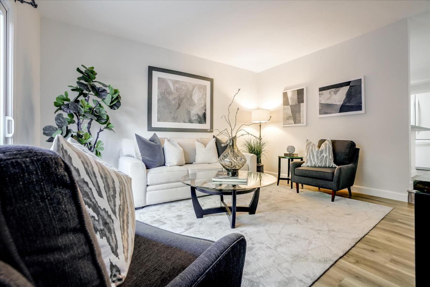 5282 Pebbletree Way San Jose, CA 95111 - Photo 20 of 39 a living room with furniture and a rug