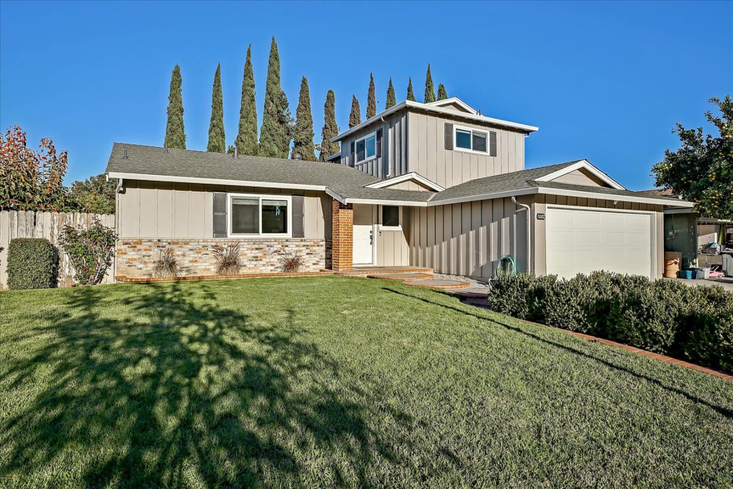 5282 Pebbletree Way San Jose, CA 95111 - Photo 3 of 39 a front view of a house with garden