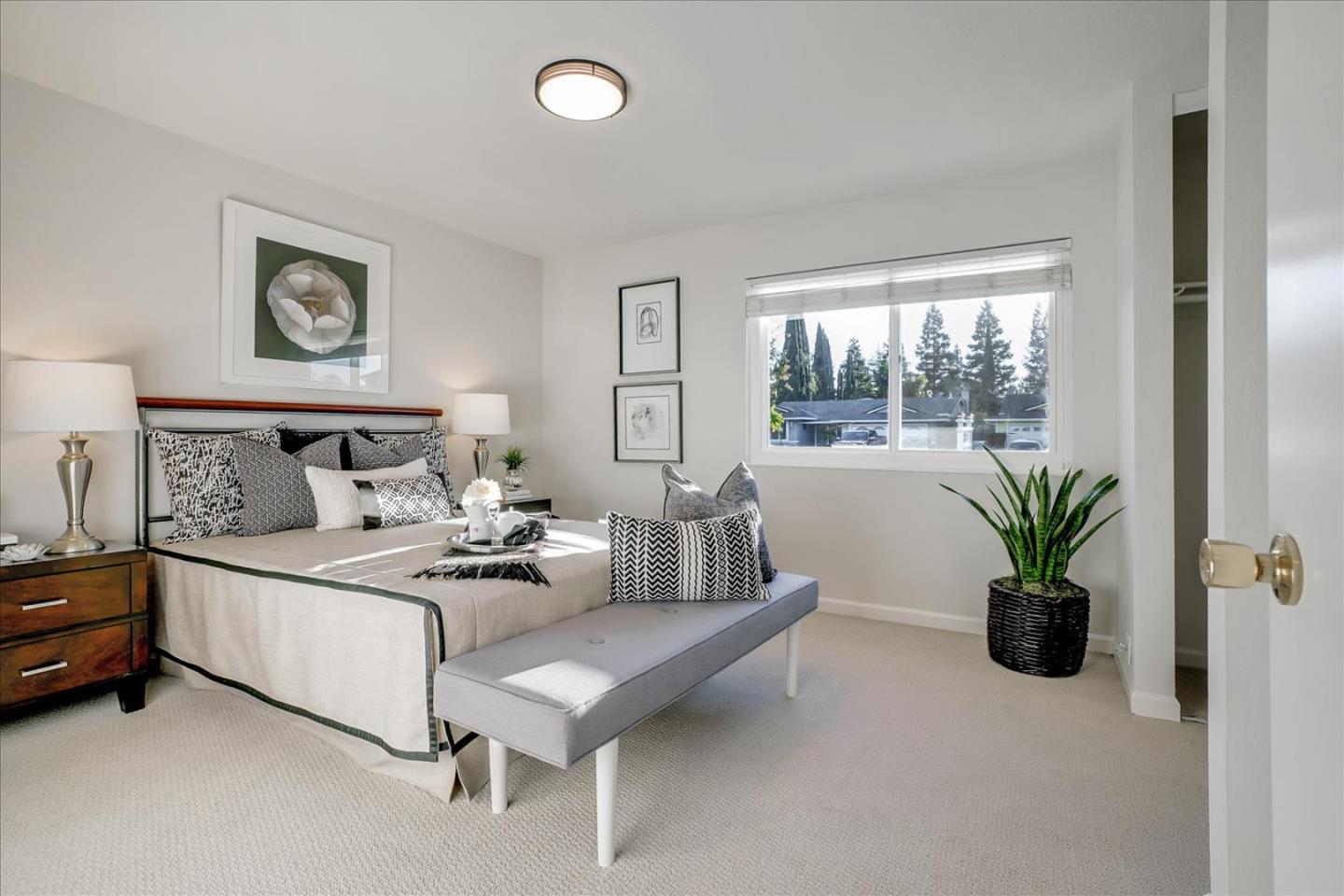 5282 Pebbletree Way San Jose, CA 95111 - Photo 21 of 39 a bedroom with furniture and a bed