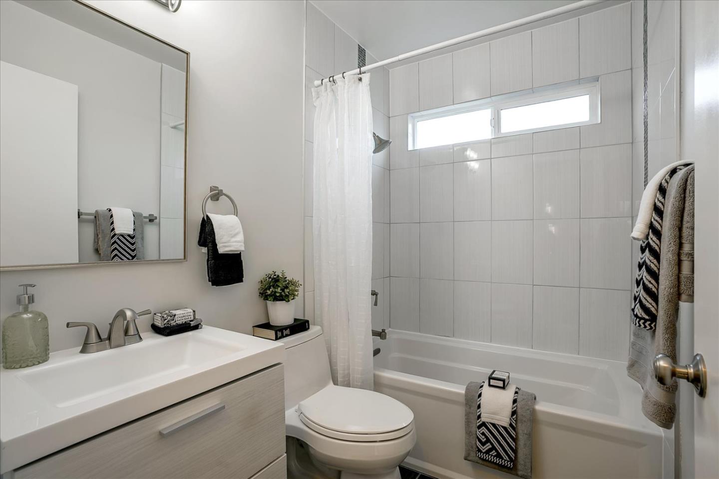 5282 Pebbletree Way San Jose, CA 95111 - Photo 31 of 39 a bathroom with a sink a toilet and shower