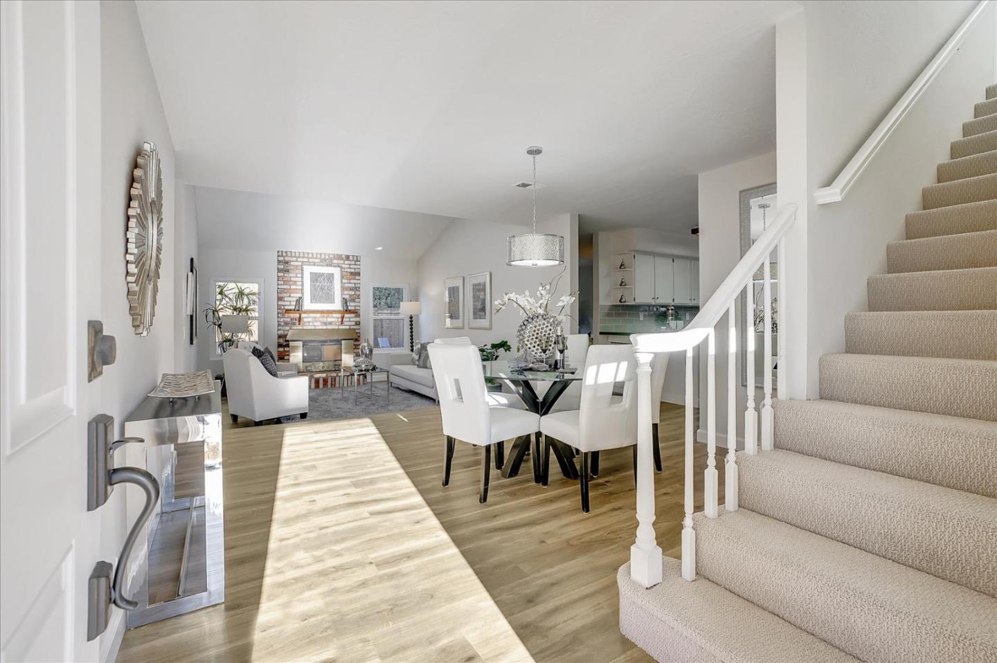 5282 Pebbletree Way San Jose, CA 95111 - Photo 7 of 39 a living room with lots of furniture and a dining table with wooden floor