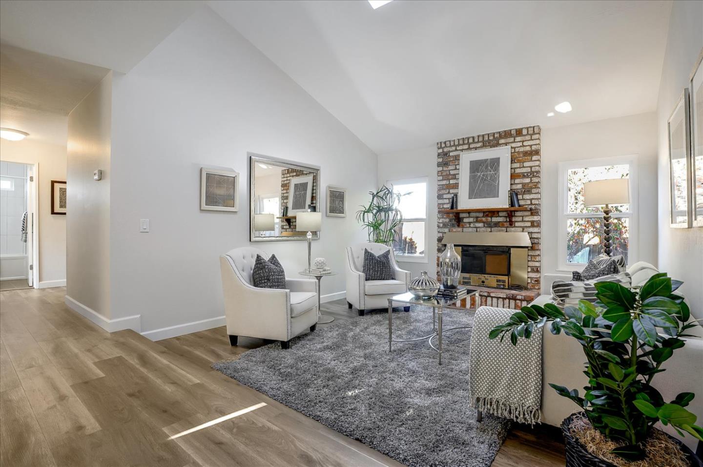 5282 Pebbletree Way San Jose, CA 95111 - Photo 8 of 39 a living room with furniture and a fireplace