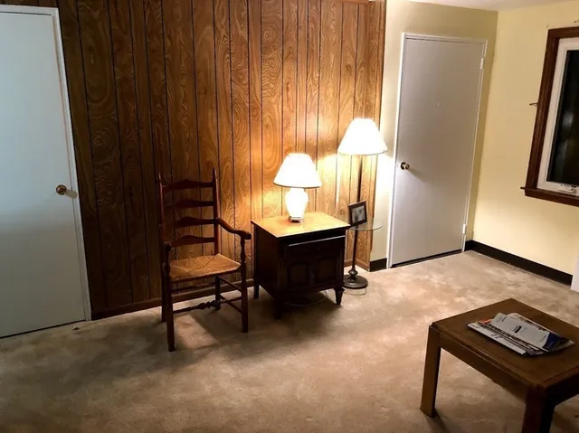 a room with furniture and a window