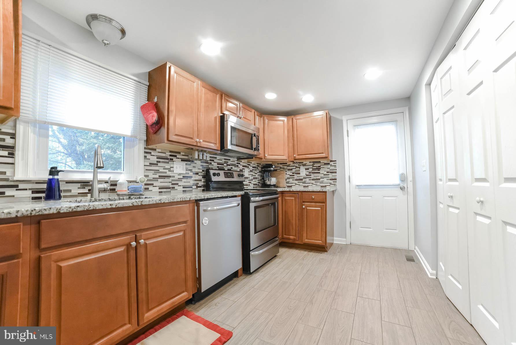 924 Crystal Rock Road Lusby, MD 20657 - Photo 15 of 58 Kitchen with side door