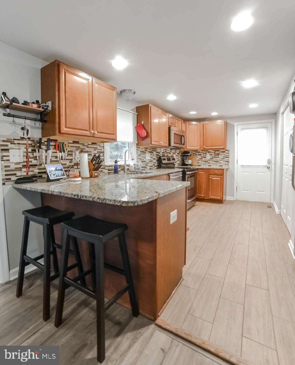 924 Crystal Rock Road Lusby, MD 20657 - Photo 18 of 58 Kitchen breakfast bar