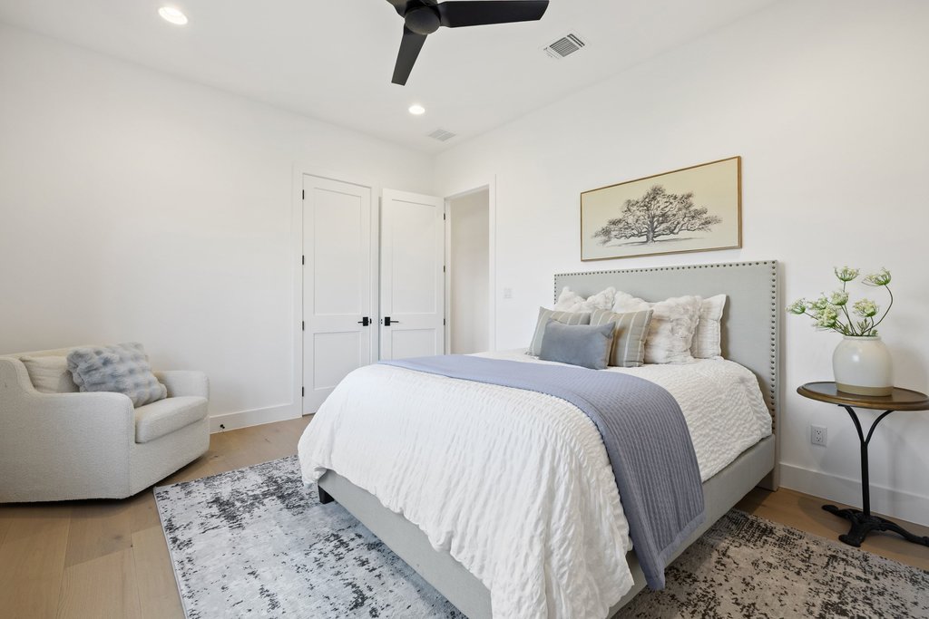 6316 Caudill Lane Austin, TX 78738 - Photo 23 of 40 Bedroom with ceiling fan, recessed lighting, and wood finished floors
