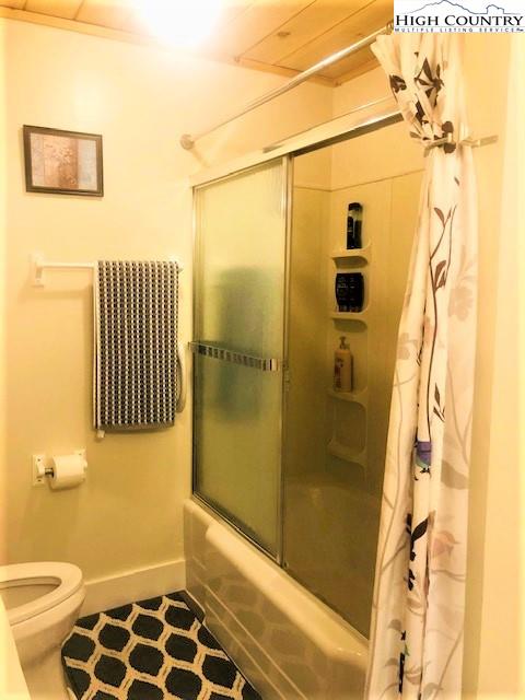 786 Teaberry Road Warrensville, NC 28693 - Photo 23 of 35 a bathroom with a shower
