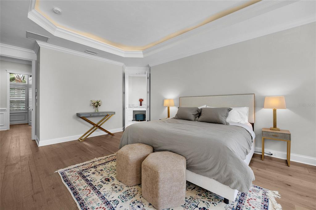 11372 Southwest 30th Avenue Gainesville, FL 32608 - Photo 21 of 71 a bedroom with a bed and wooden floor