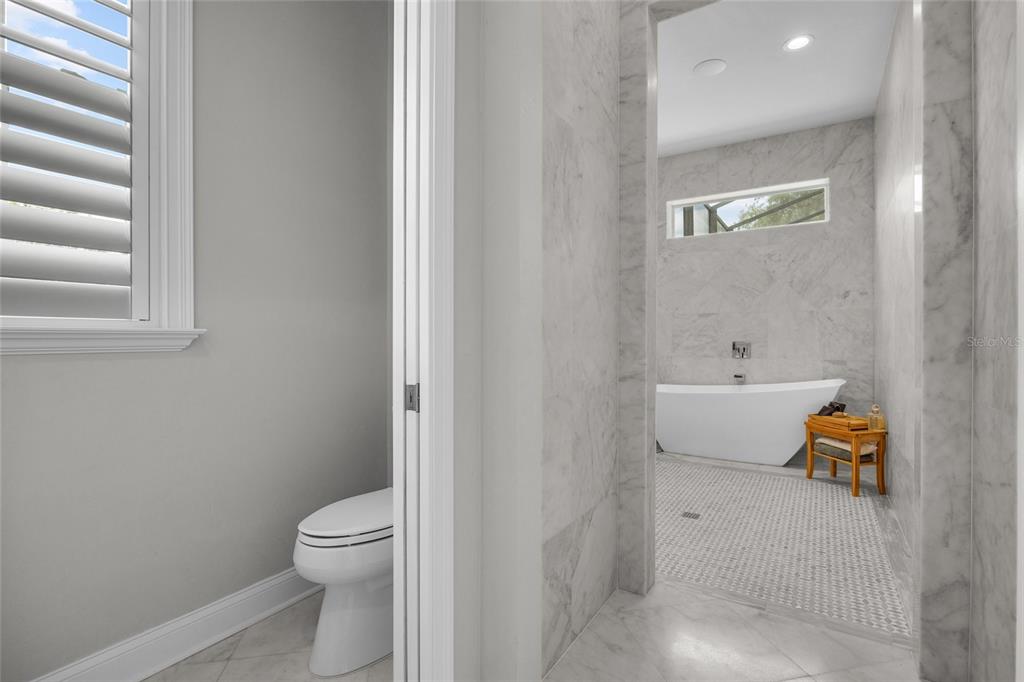 11372 Southwest 30th Avenue Gainesville, FL 32608 - Photo 27 of 71 a bathroom with a sink and a bathtub