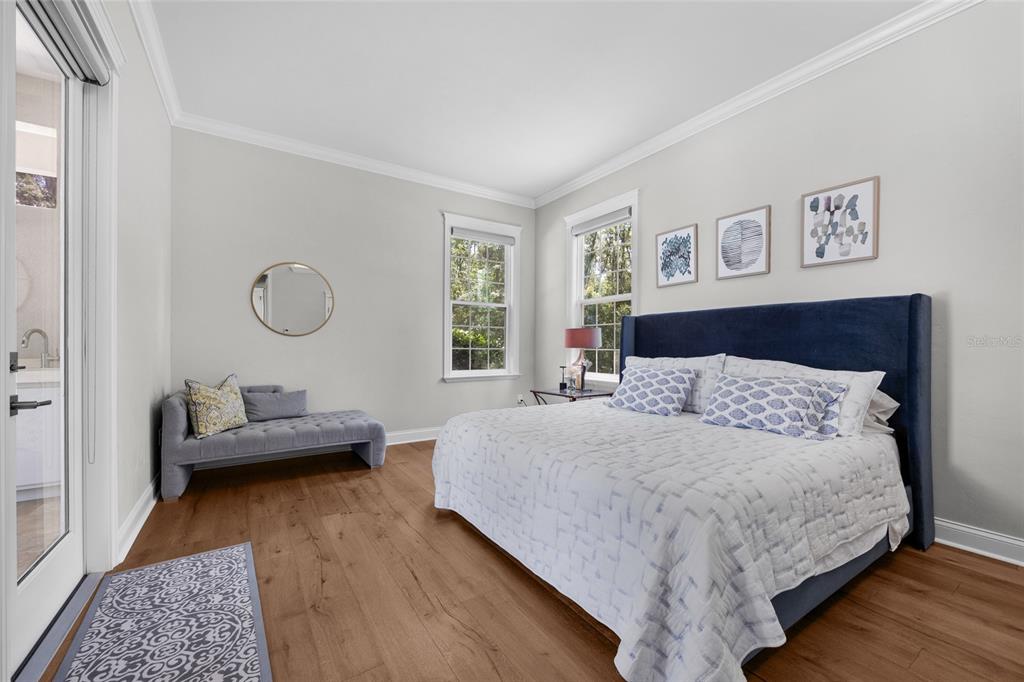 11372 Southwest 30th Avenue Gainesville, FL 32608 - Photo 29 of 71 a bedroom with a bed and a couch