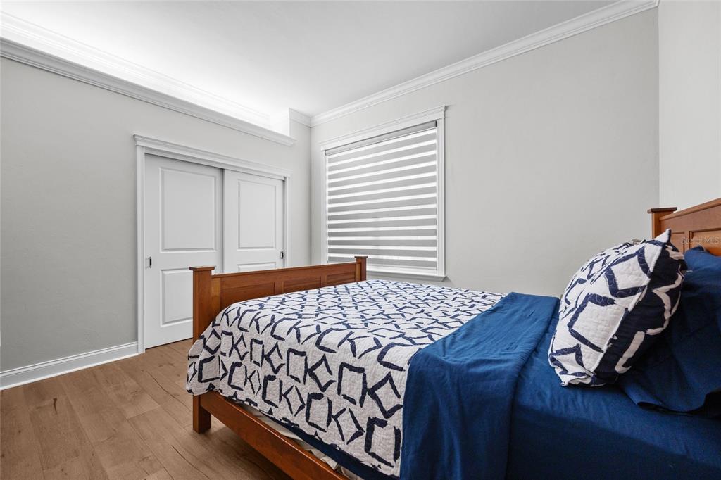 11372 Southwest 30th Avenue Gainesville, FL 32608 - Photo 34 of 71 a bedroom with a bed and a window