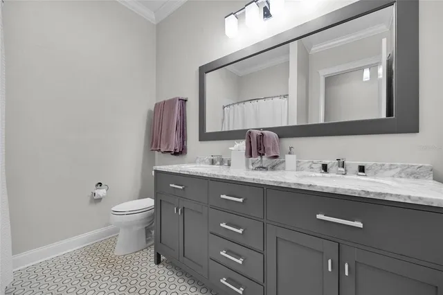 a view of a dining room with furniture and outdoor view