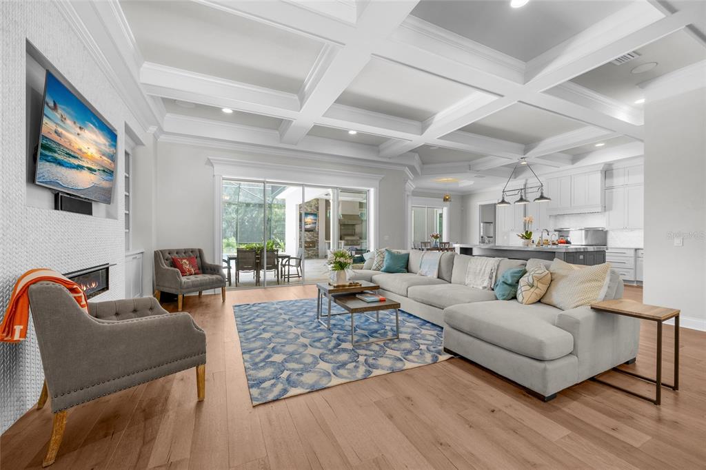 11372 Southwest 30th Avenue Gainesville, FL 32608 - Photo 4 of 71 a living room with furniture and a flat screen tv