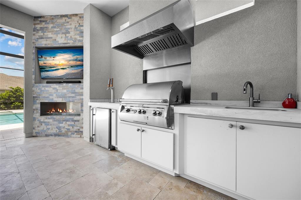 11372 Southwest 30th Avenue Gainesville, FL 32608 - Photo 44 of 71 a kitchen with a stove and a fireplace