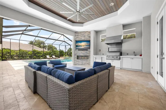 an aerial view of residential house with outdoor space and lake view