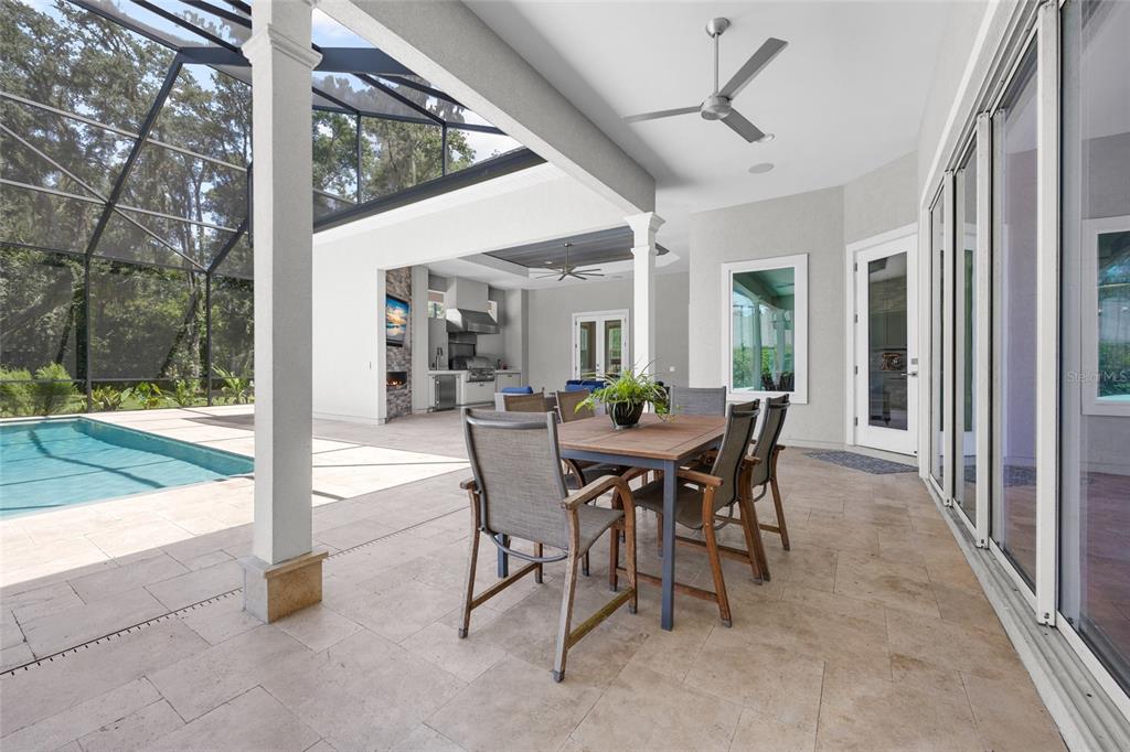 11372 Southwest 30th Avenue Gainesville, FL 32608 - Photo 46 of 71 a view of a dining room with furniture and outdoor view
