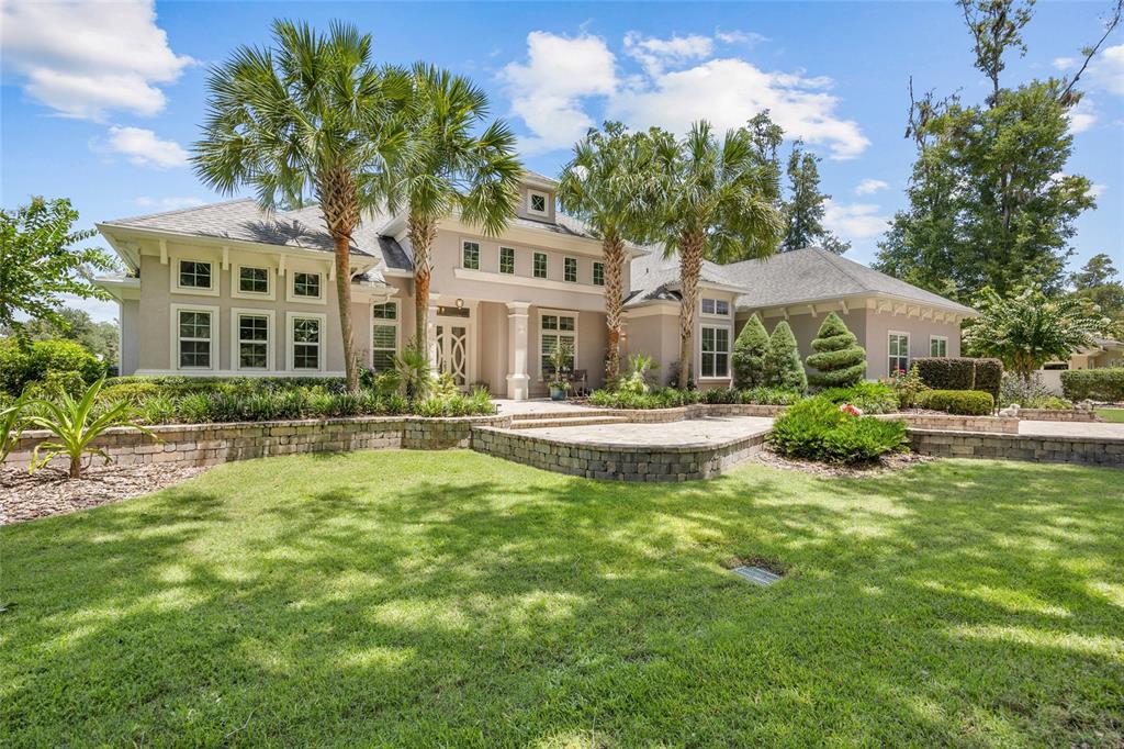 11372 Southwest 30th Avenue Gainesville, FL 32608 - Photo 53 of 71 a front view of a house with yard and green space
