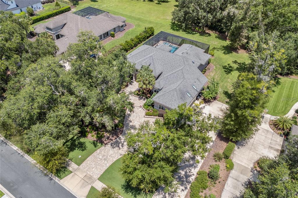 11372 Southwest 30th Avenue Gainesville, FL 32608 - Photo 64 of 71 an aerial view of a house with a yard and garden