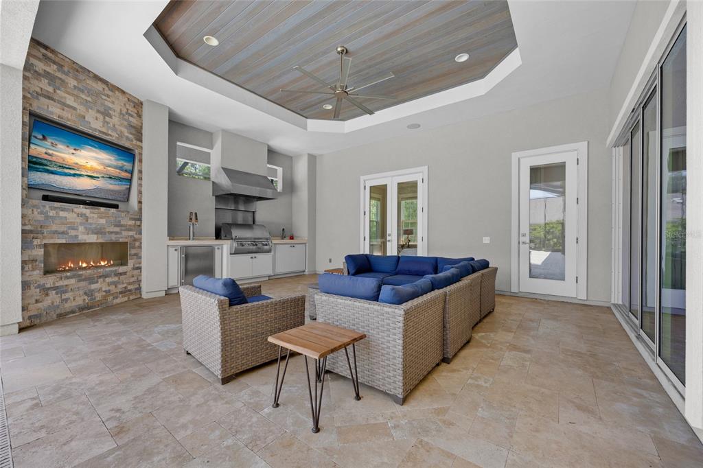 11372 Southwest 30th Avenue Gainesville, FL 32608 - Photo 9 of 71 a living room with furniture and a flat screen tv