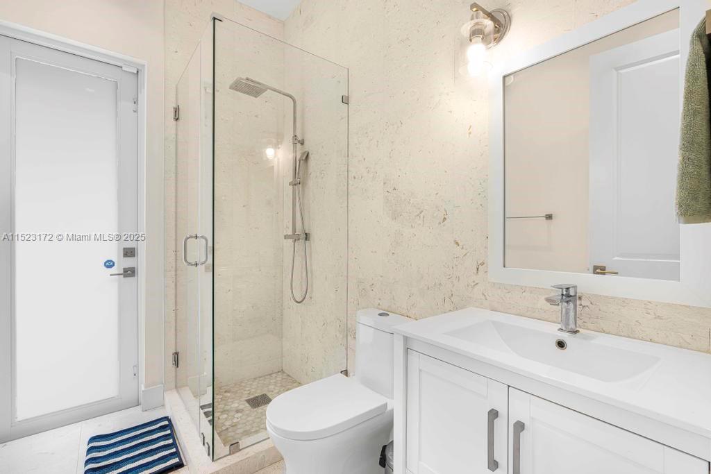 Coral Terrace Miami, FL 33155 - Photo 13 of 51 a bathroom with a sink a toilet and shower