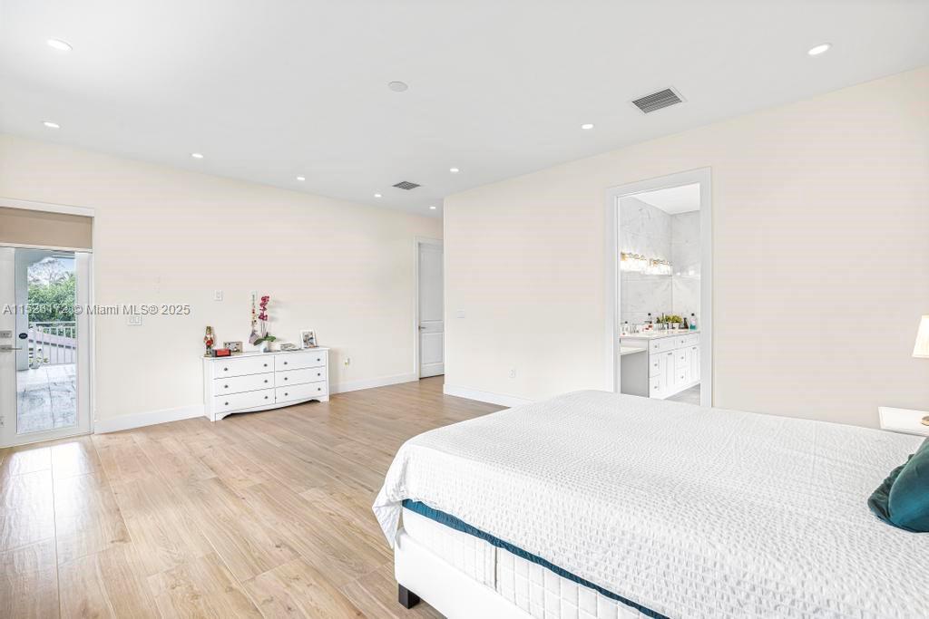 Coral Terrace Miami, FL 33155 - Photo 19 of 51 a large white bed in a white room