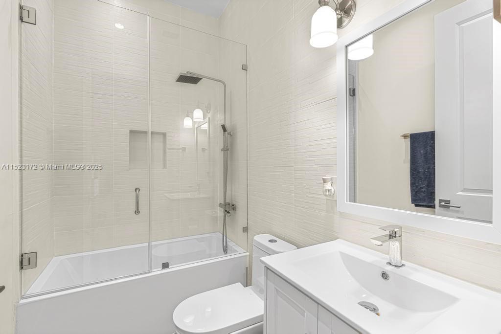 Coral Terrace Miami, FL 33155 - Photo 26 of 51 a bathroom with a sink toilet and shower