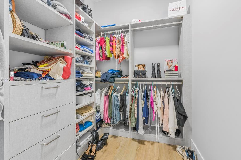 Coral Terrace Miami, FL 33155 - Photo 32 of 51 a view of walk in closet with clothes