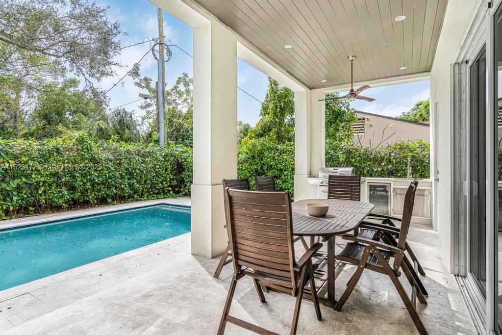 Coral Terrace Miami, FL 33155 - Photo 35 of 51 a view of an outdoor dining space with a table and chairs