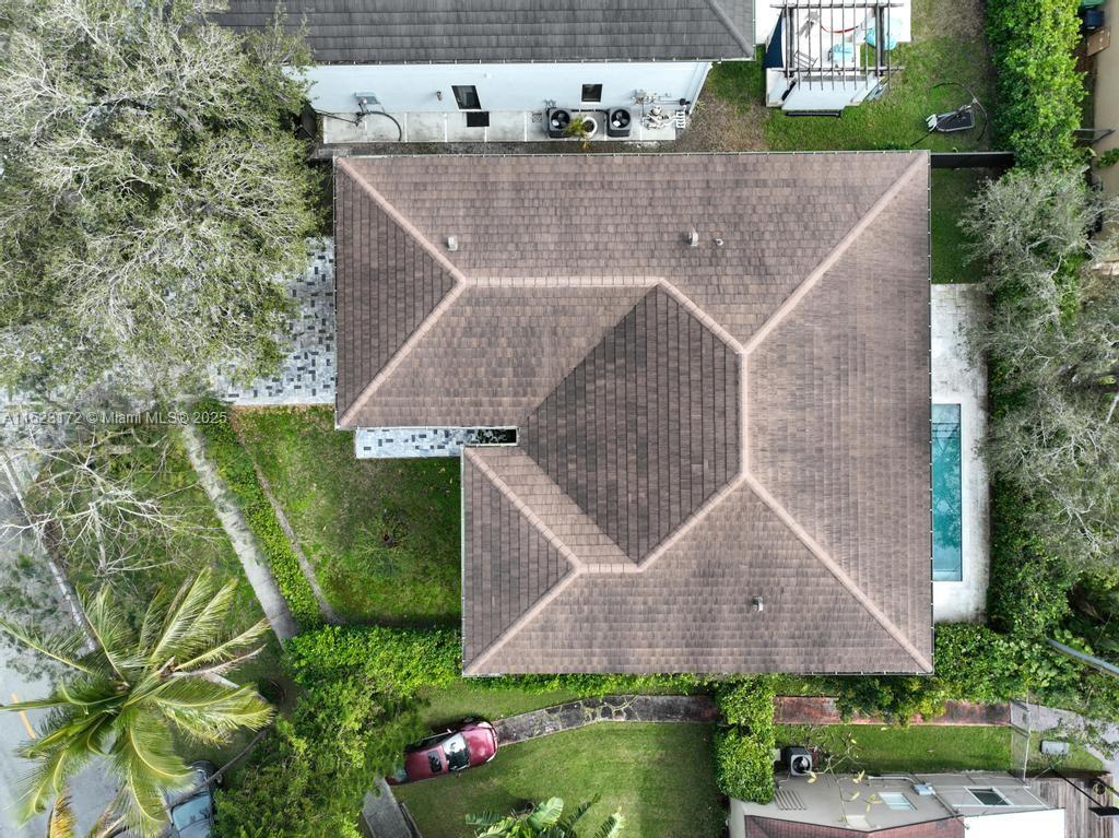 Coral Terrace Miami, FL 33155 - Photo 44 of 51 an aerial view of a house with a yard and potted plants
