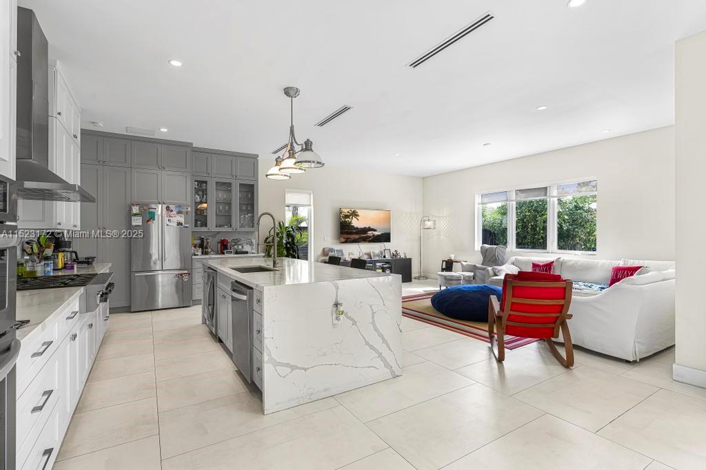 Coral Terrace Miami, FL 33155 - Photo 5 of 51 a living room with furniture and kitchen view