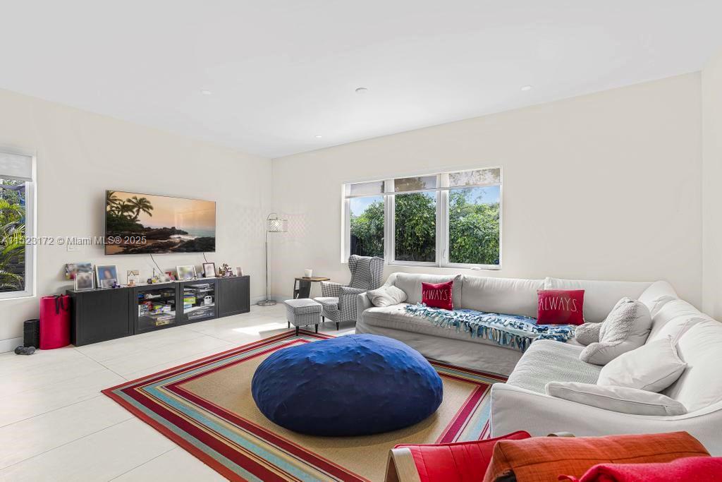 Coral Terrace Miami, FL 33155 - Photo 6 of 51 a living room with furniture and a flat screen tv