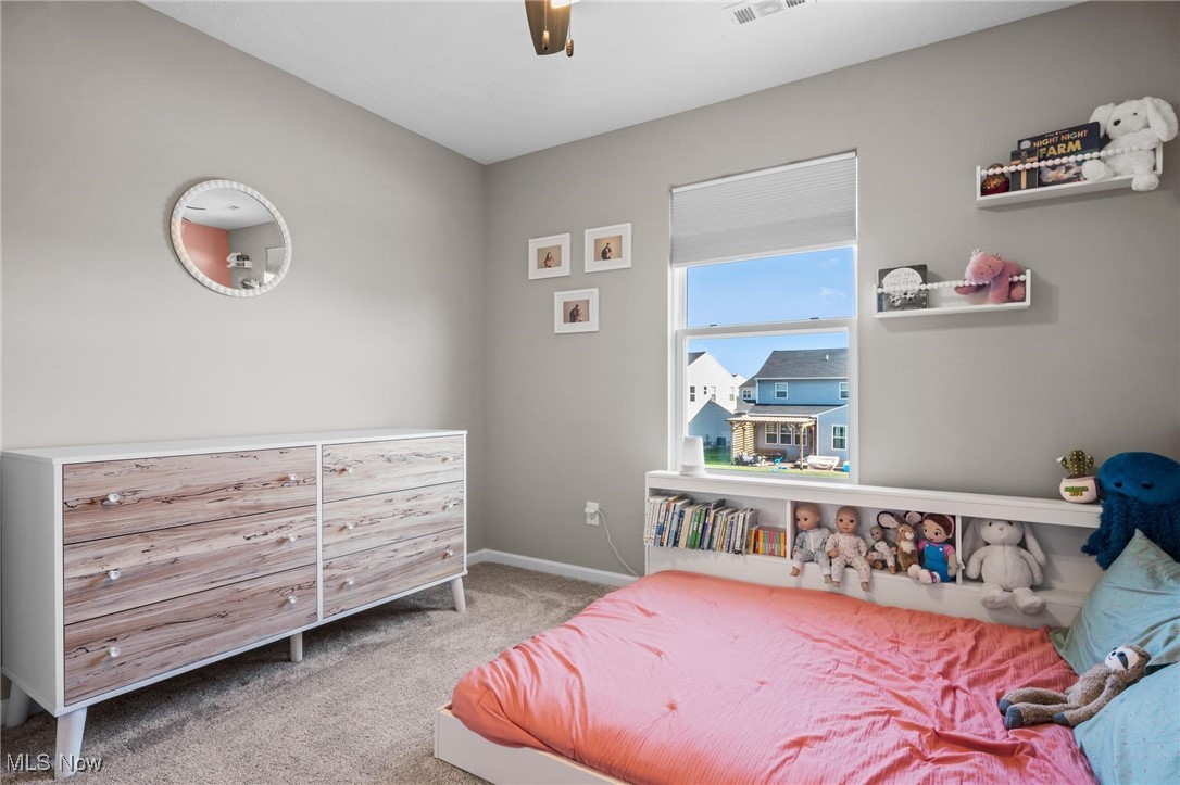37174 Amber Way North Ridgeville, OH 44039 - Photo 26 of 40 Carpeted bedroom with baseboards and ceiling fan