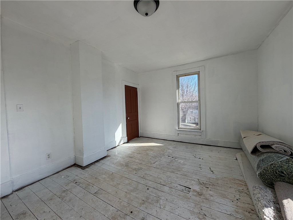 230 West Decatur Street Eaton, OH 45320 - Photo 16 of 22 This bright room features durable wood flooring and ample natural light, awaiting your personal touch.