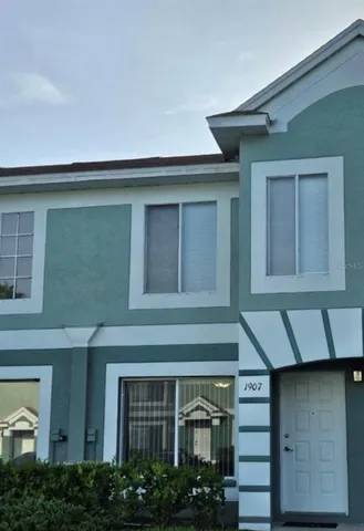 a front view of a house with a garage