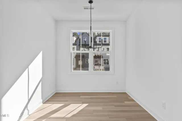 a view of a room with windows