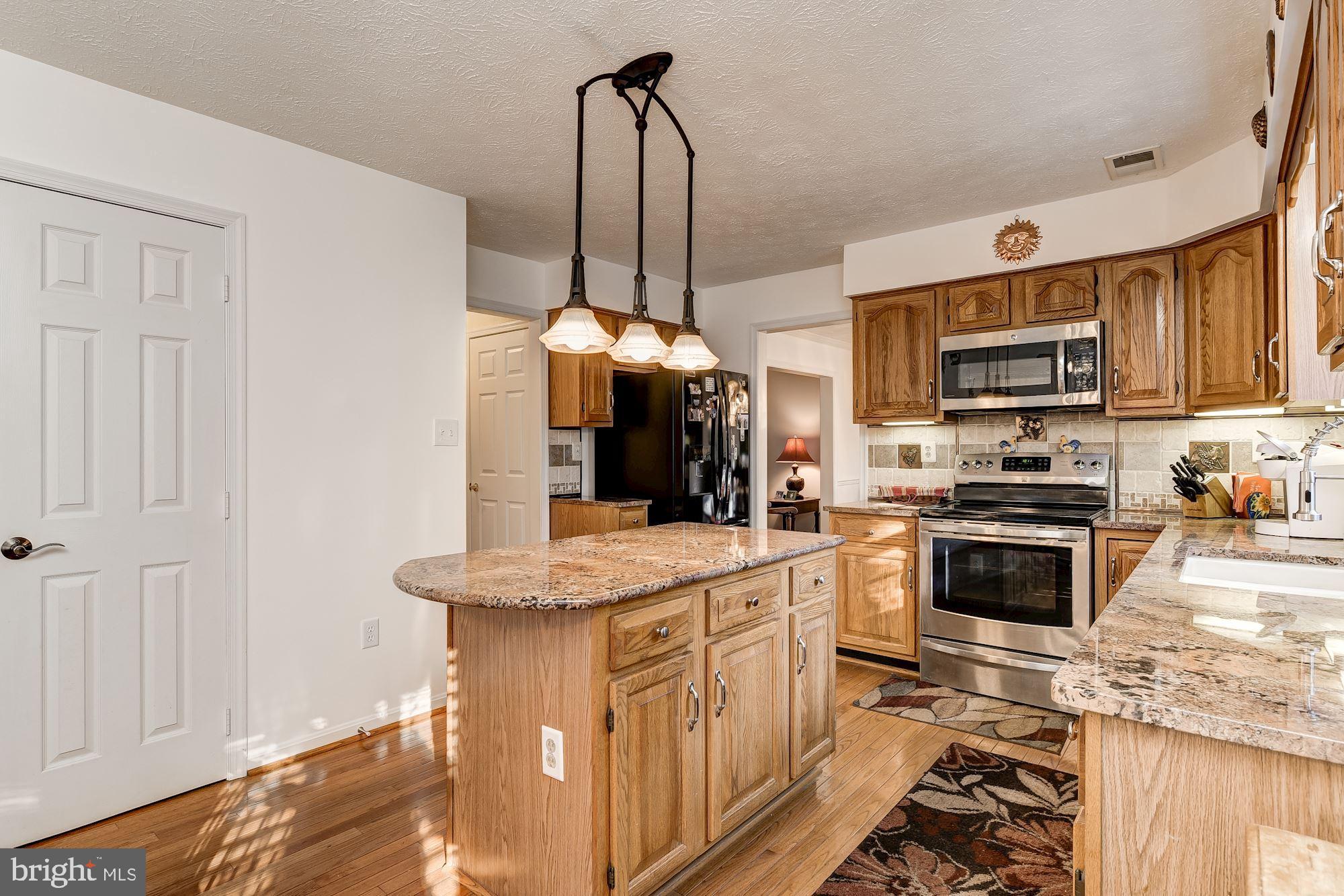 9 Oak Run Road Laurel, MD 20724 - Photo 22 of 63 Island and Kitchen