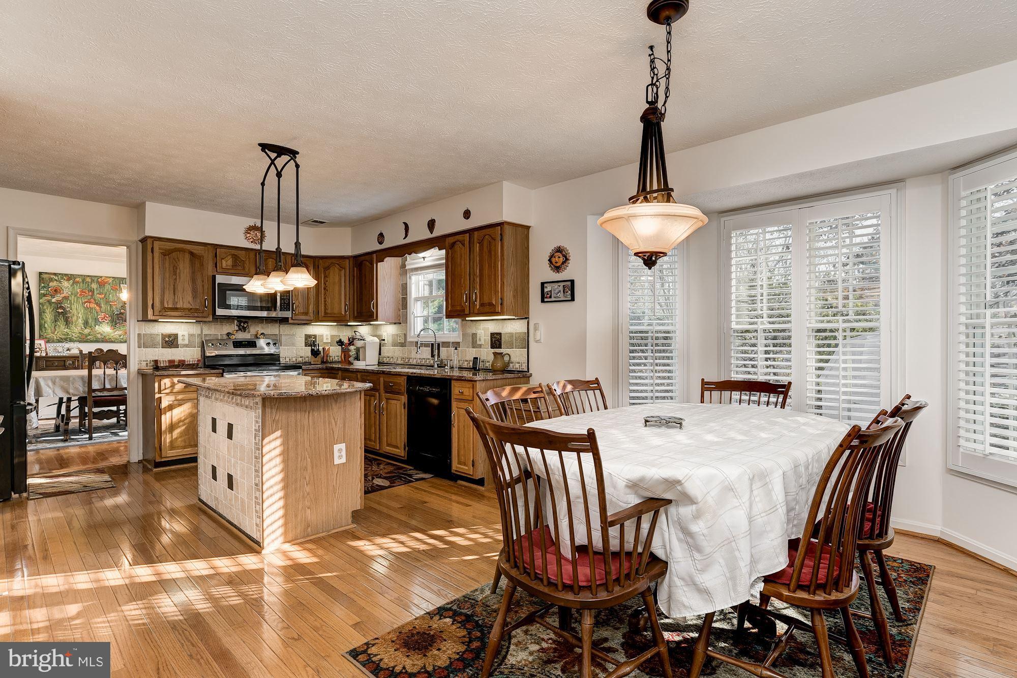 9 Oak Run Road Laurel, MD 20724 - Photo 25 of 63 Table Space and Kitchen