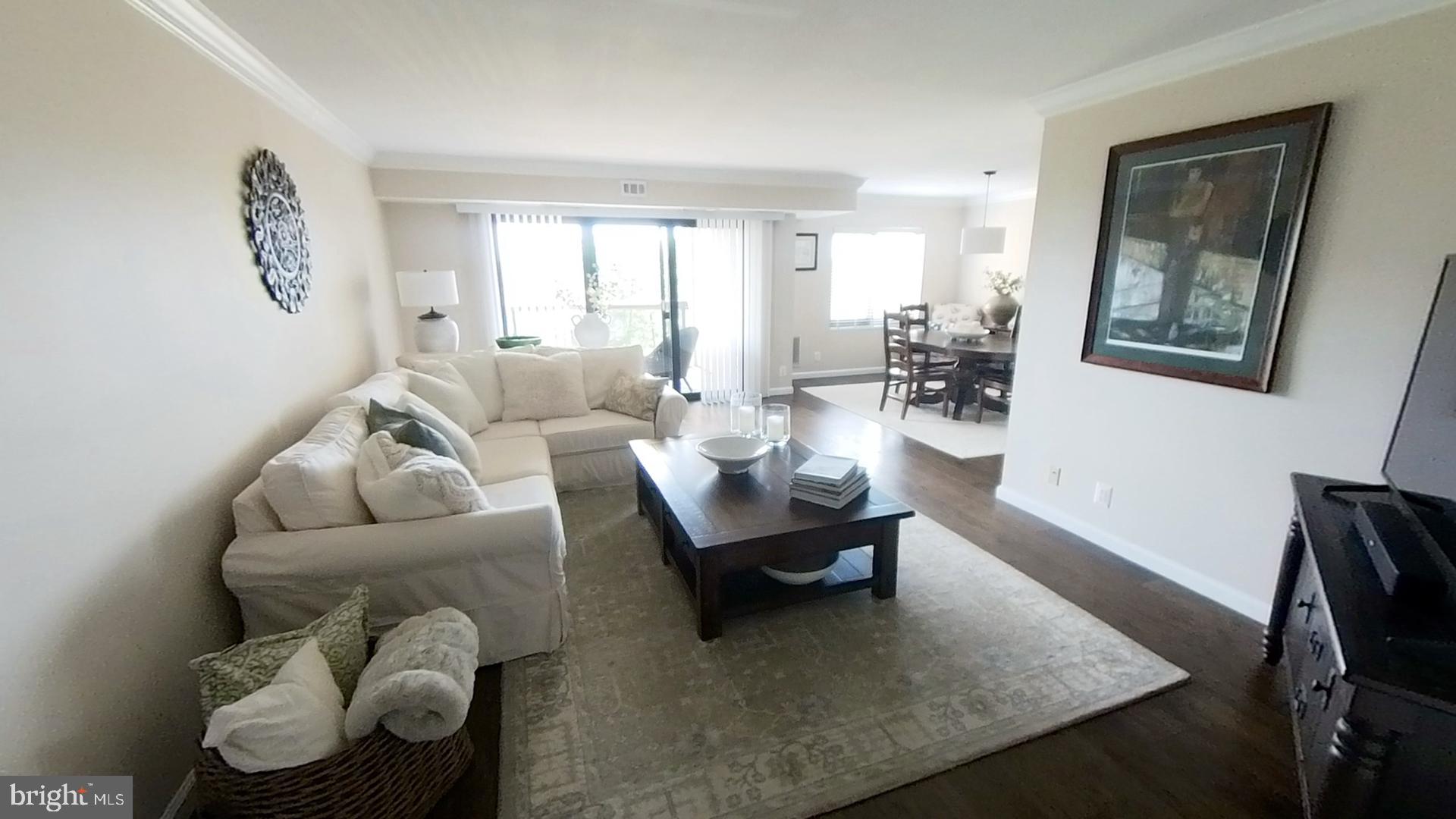 1915 Benning Road Northeast Washington, DC 20002 - Photo 2 of 22 a living room with furniture and a window