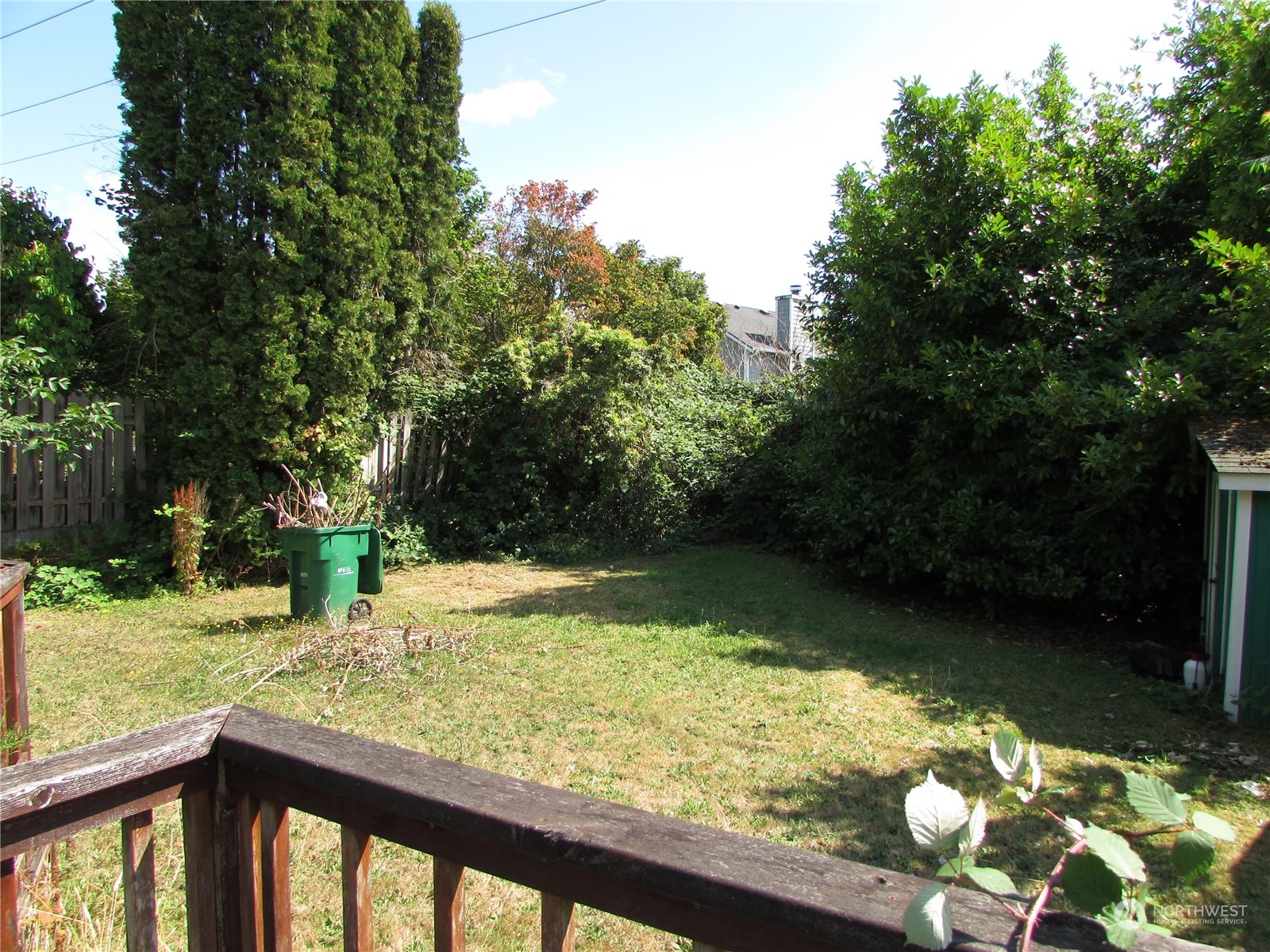 616 212th Street Southwest Bothell, WA 98021 - Photo 18 of 20 a view of a yard with wooden fence