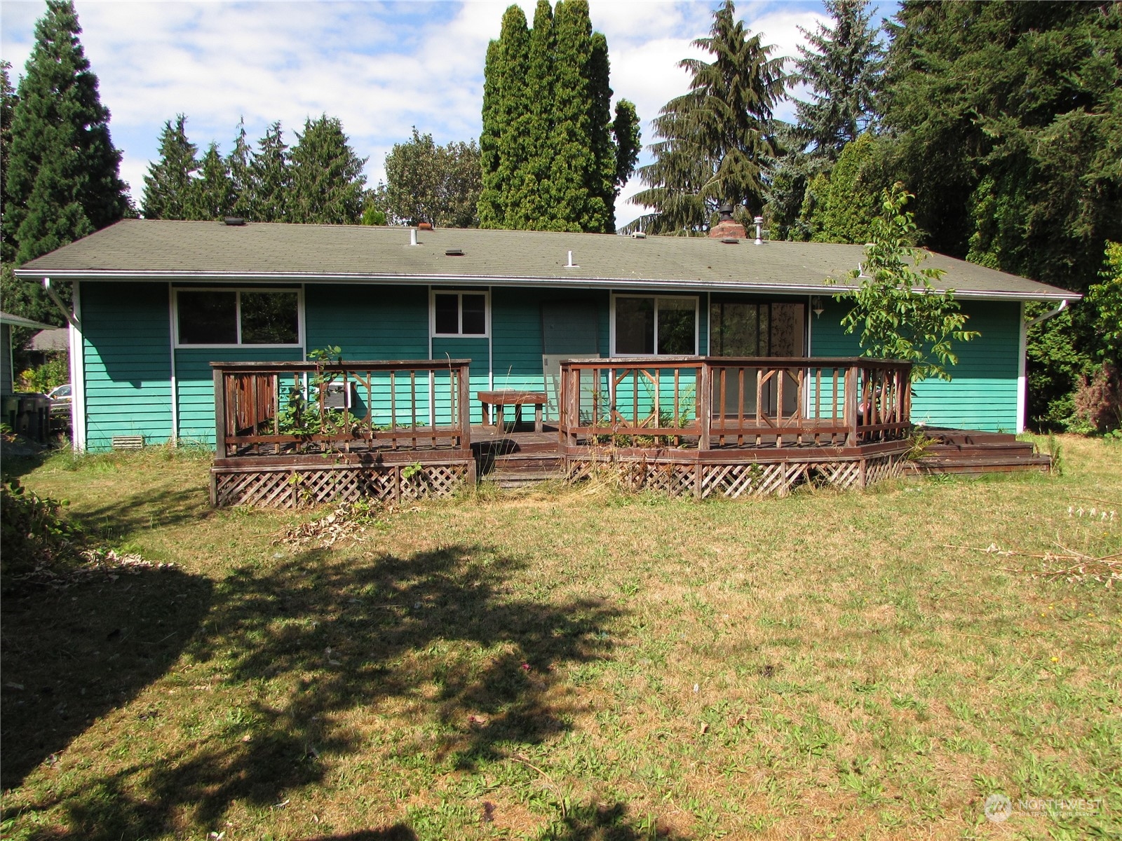 616 212th Street Southwest Bothell, WA 98021 - Photo 20 of 20 a front view of house with yard outdoor seating and barbeque oven
