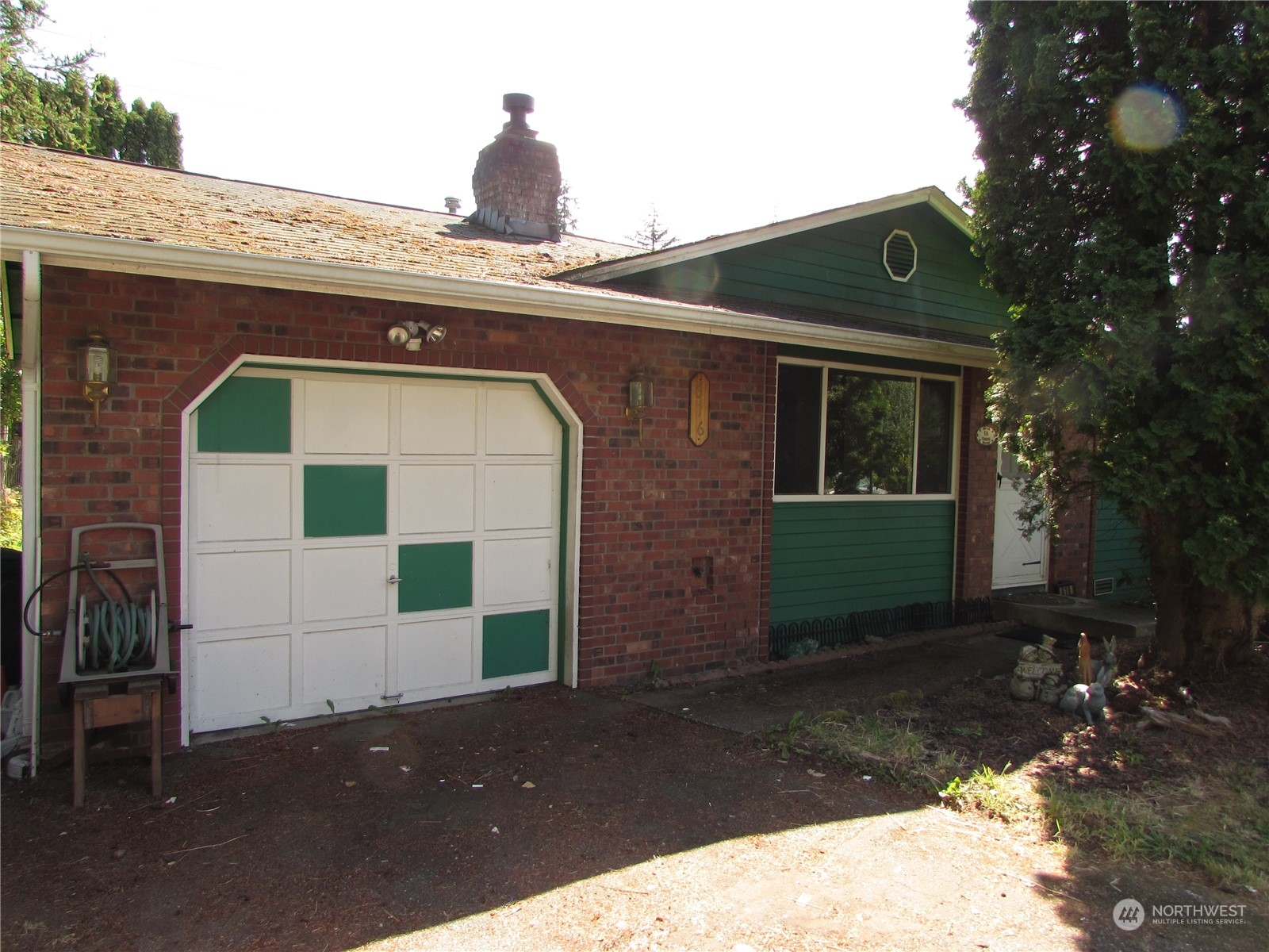 616 212th Street Southwest Bothell, WA 98021 - Photo 2 of 20 a view of a front of a house with a yard