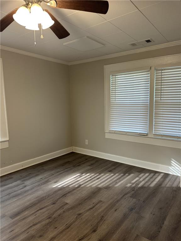 615 Cassville Road Southeast Cartersville, GA 30120 - Photo 14 of 24 a view of an empty room with wooden floor and a window