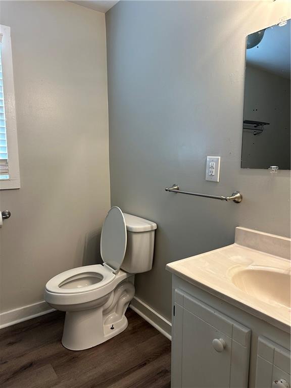 615 Cassville Road Southeast Cartersville, GA 30120 - Photo 19 of 24 a white toilet sitting next to a bathroom sink