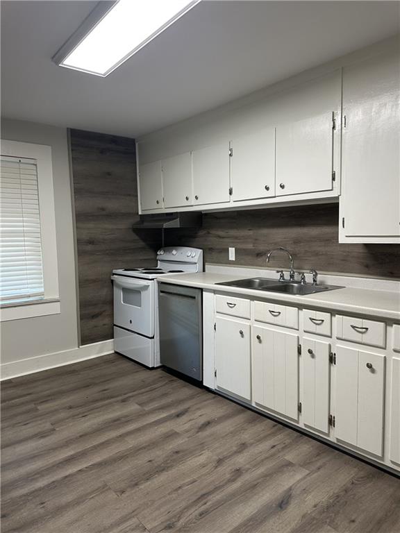 615 Cassville Road Southeast Cartersville, GA 30120 - Photo 7 of 24 a kitchen with stainless steel appliances granite countertop a stove a sink and white cabinets