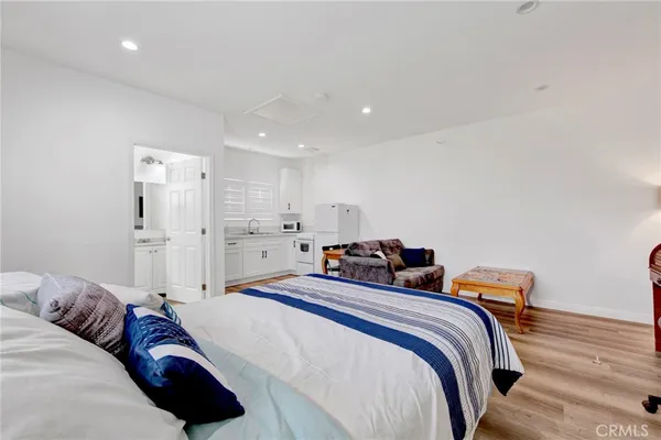 a bedroom with a bed and closet