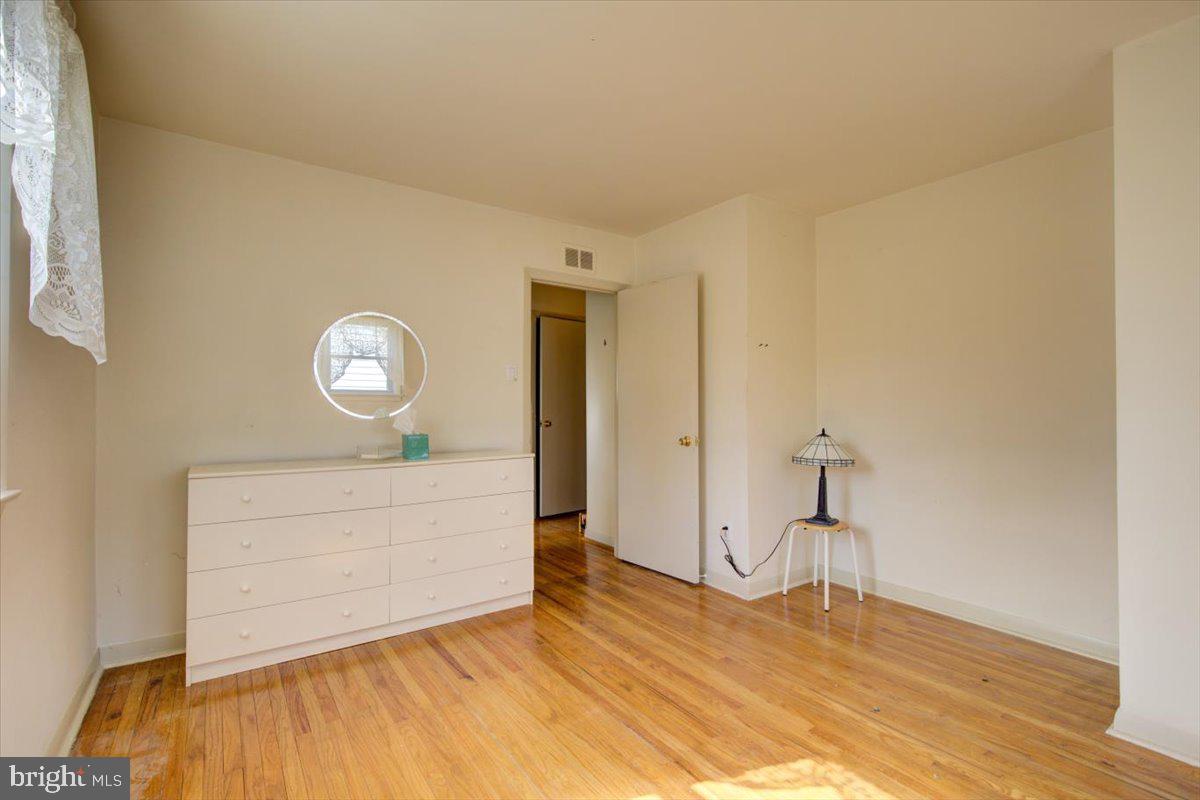 373 Lawrence Road Broomall, PA 19008 - Photo 15 of 30 a view of empty room with wooden floor