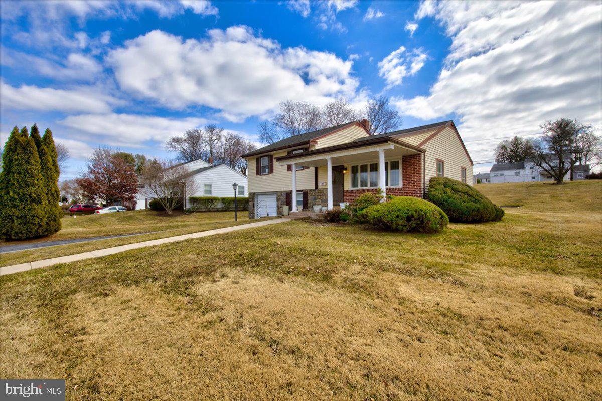 373 Lawrence Road Broomall, PA 19008 - Photo 3 of 30 a view of a house with a big yard