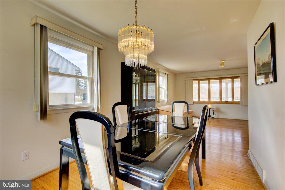 373 Lawrence Road Broomall, PA 19008 - Photo 8 of 30 a view of a dining room with furniture window and wooden floor